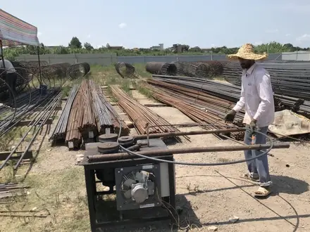 The site compound, with reinforcement being prepared and rebar cut