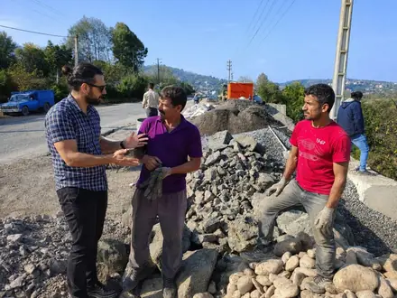 Checking the rock armour on the road shoulder
